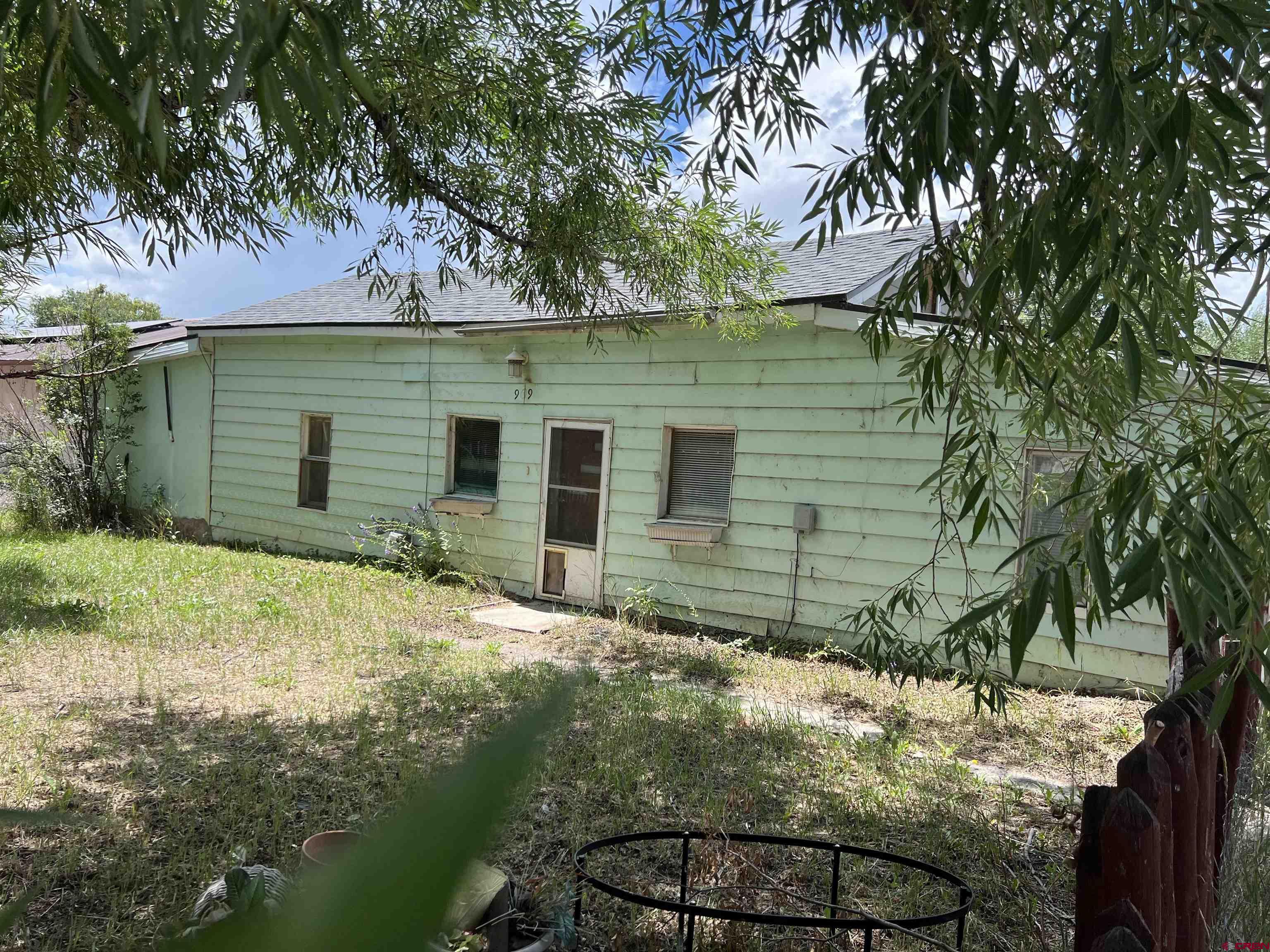 a view of backyard of house