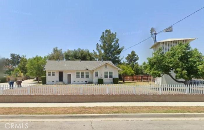 a view of a house with a street