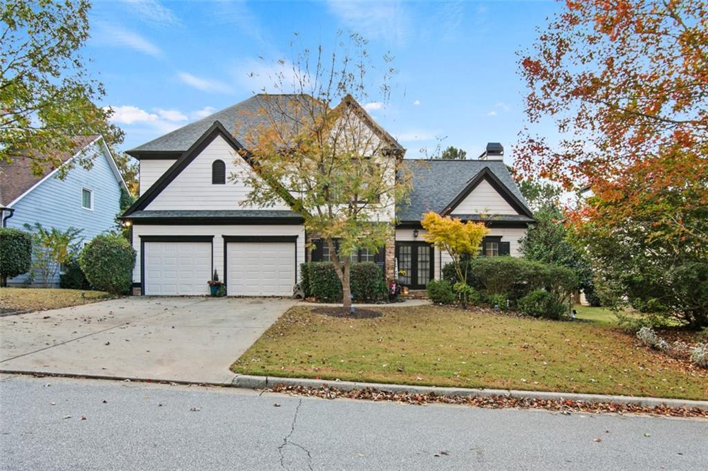 front view of a house with a yard