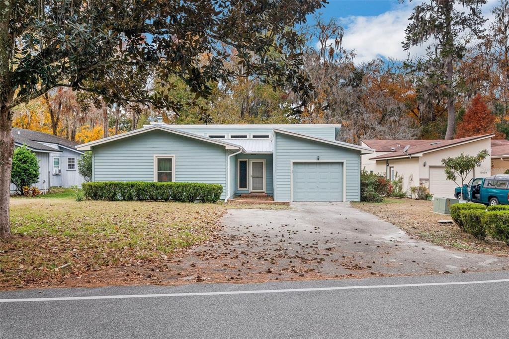 front view of a house and a yard