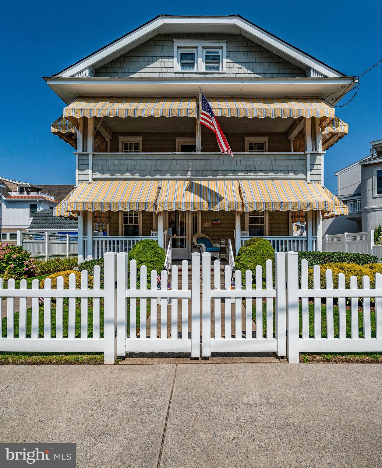 a front view of a house with a porch