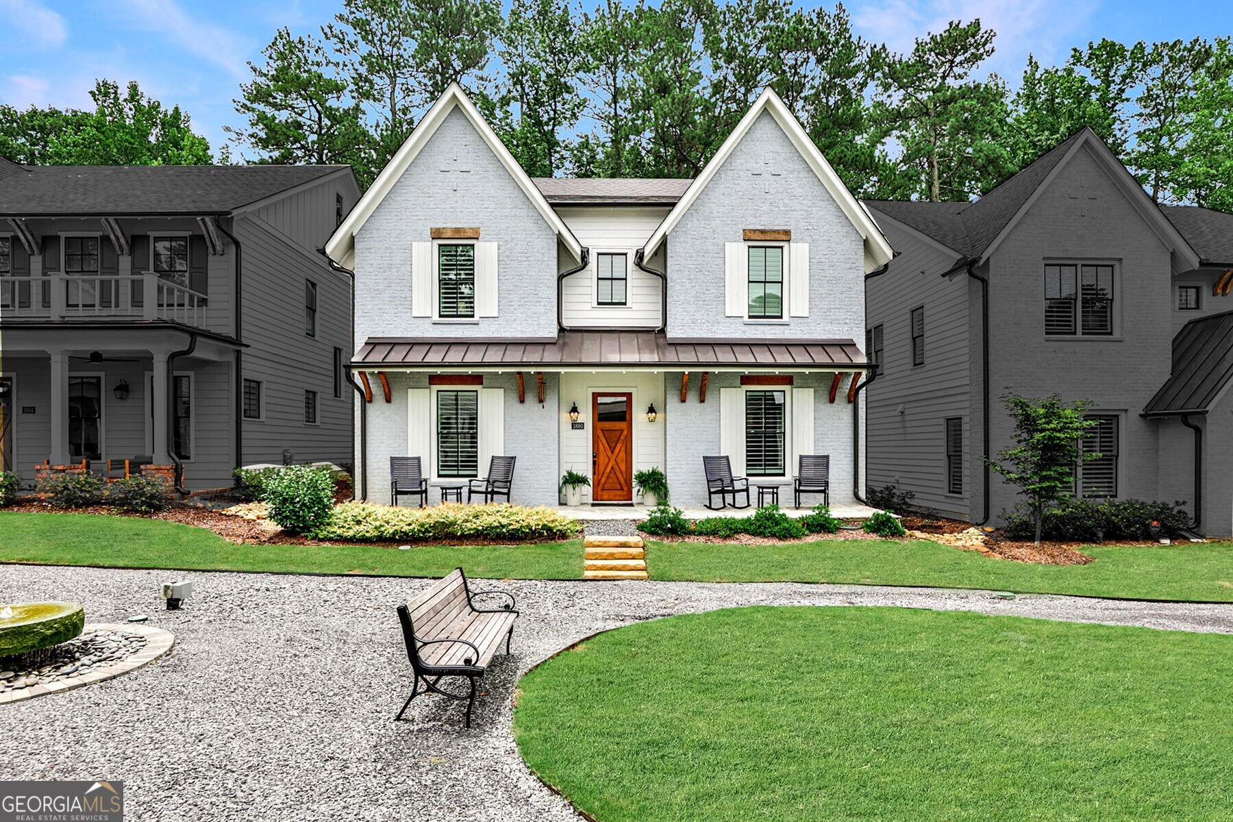 front view of a house with a yard