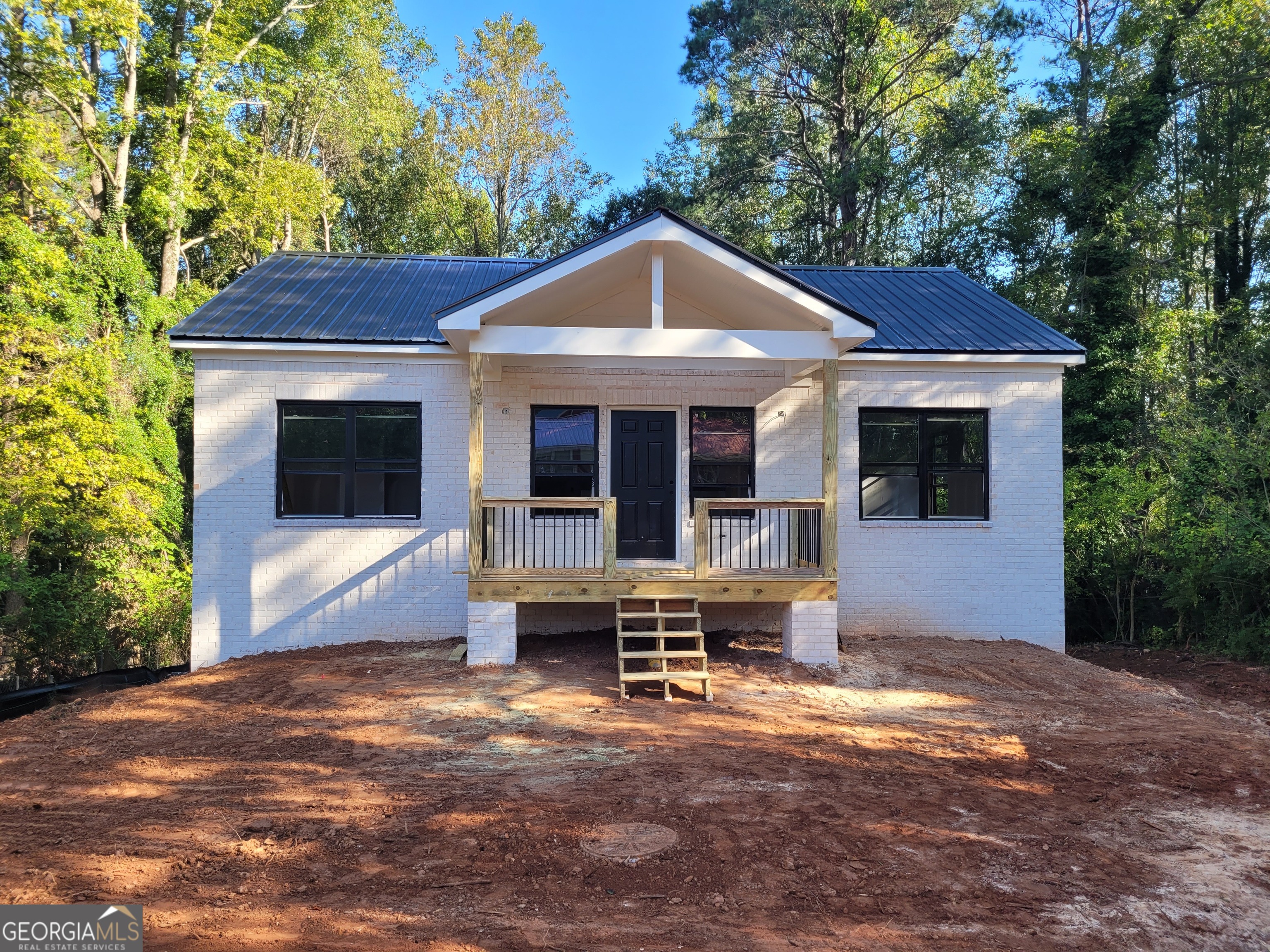 a front view of a house with porch