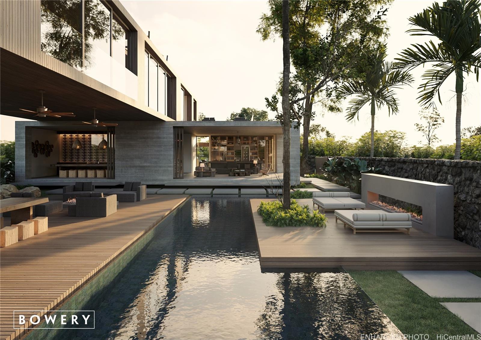 a view of a house with swimming pool and sitting area