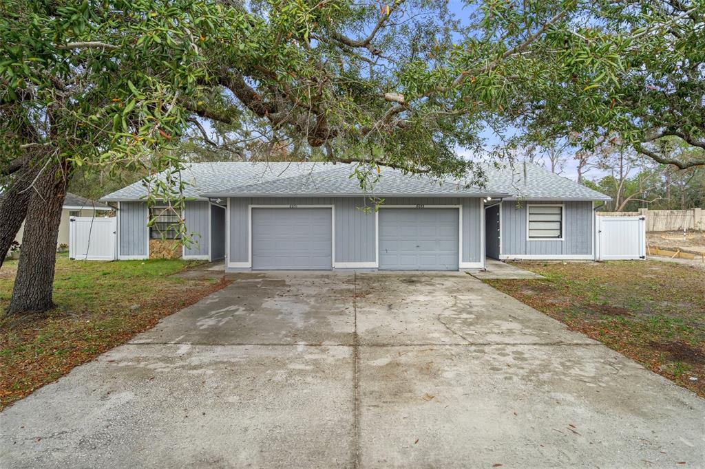 front view of a house and a yard