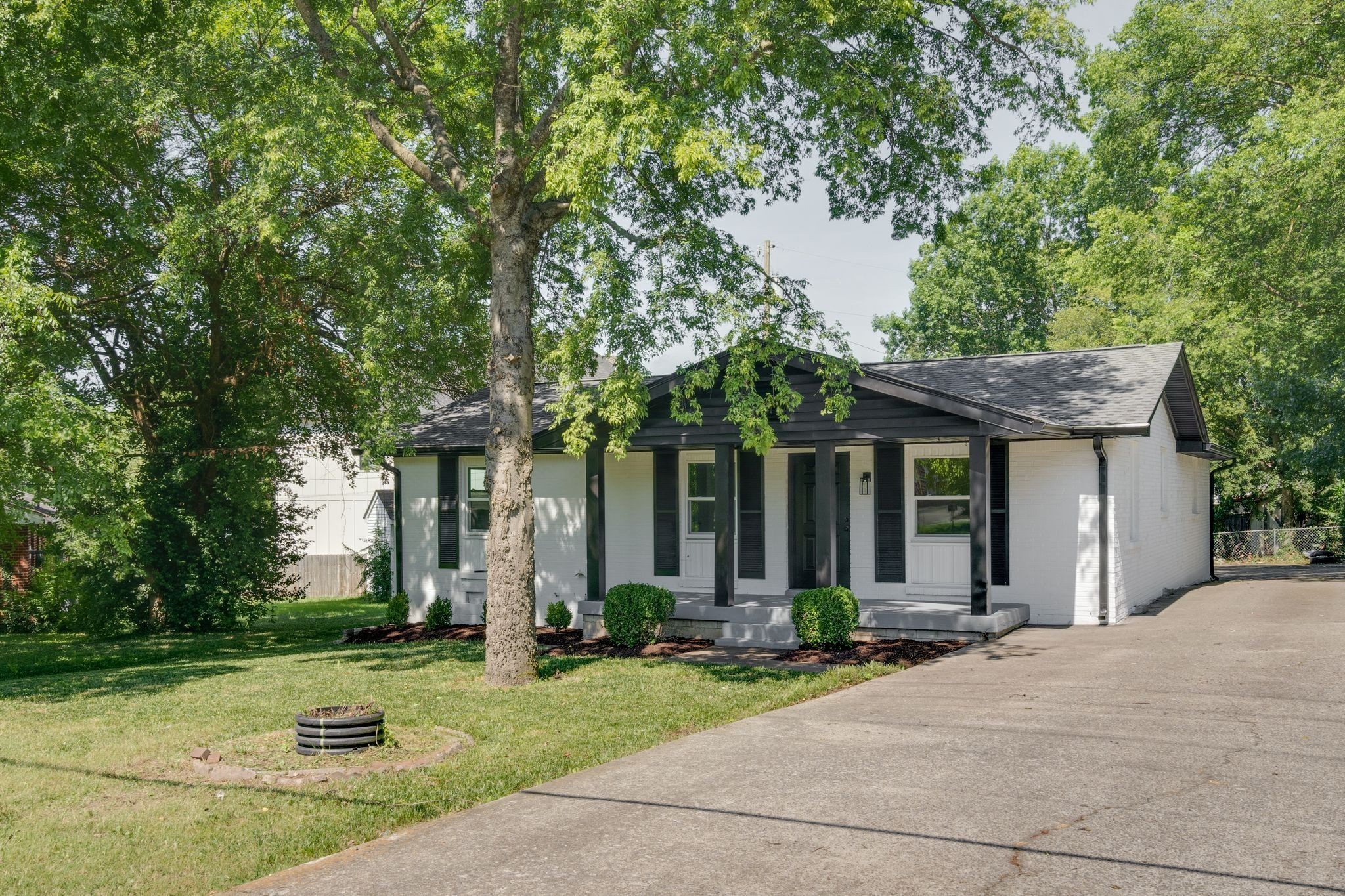 front view of a house with a yard