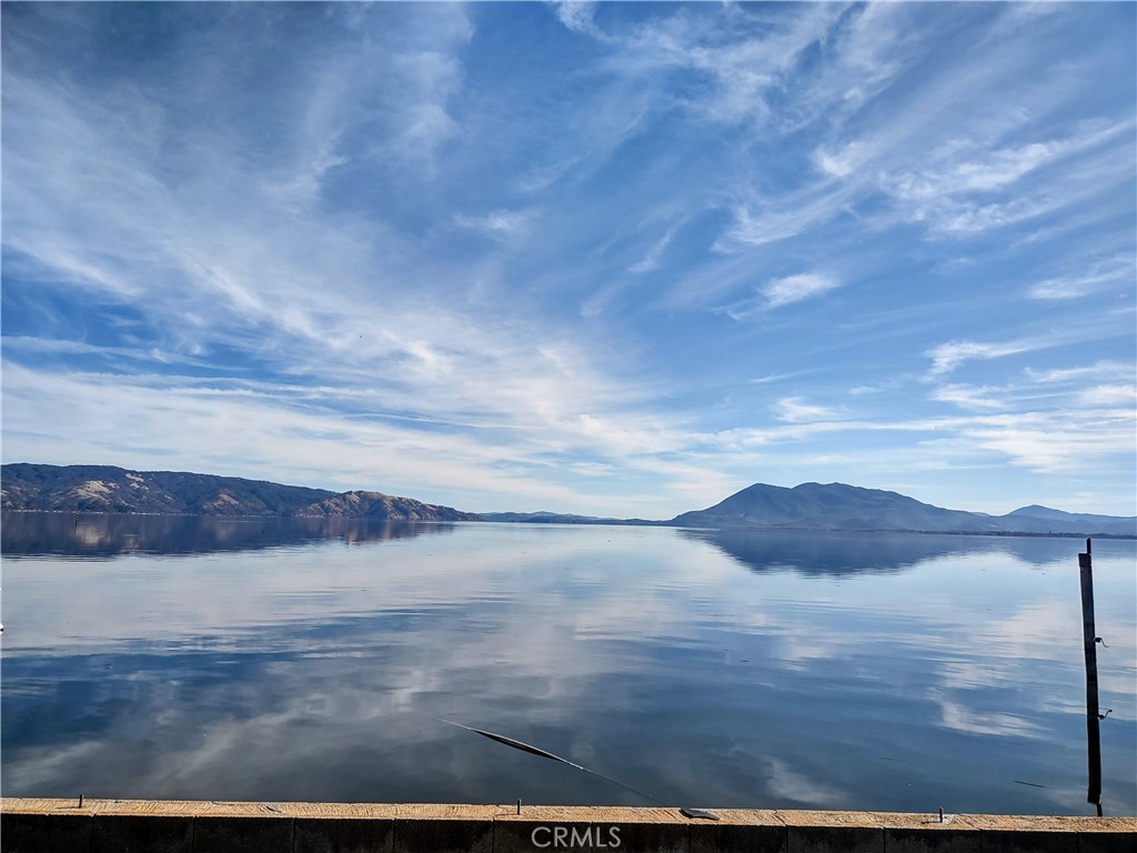 a view of ocean and mountain