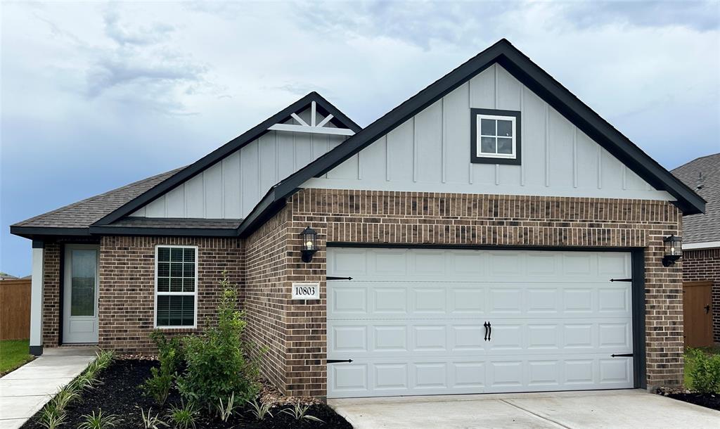 a view of outdoor space and front view of a house