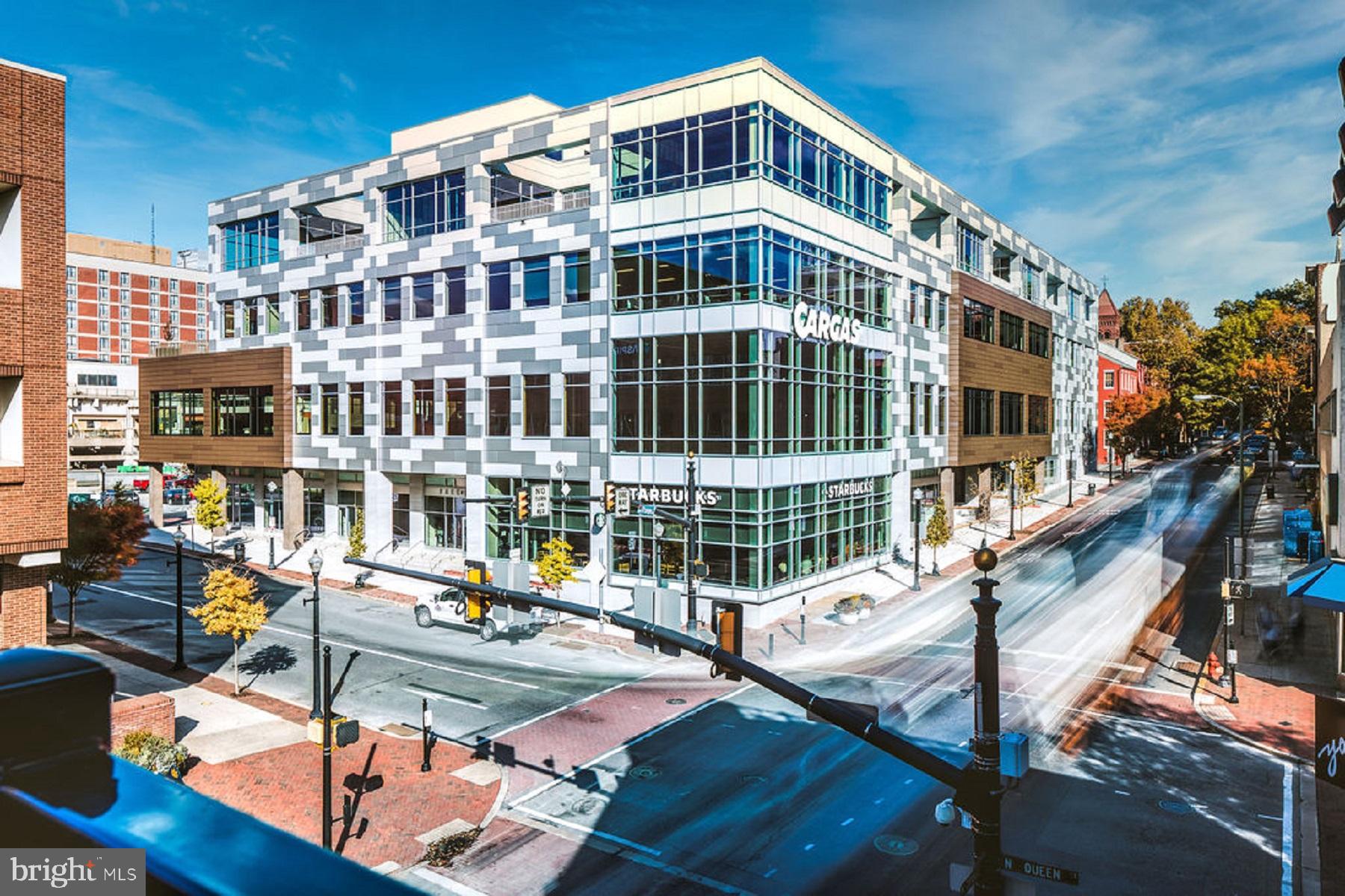 a front view of a building with street view