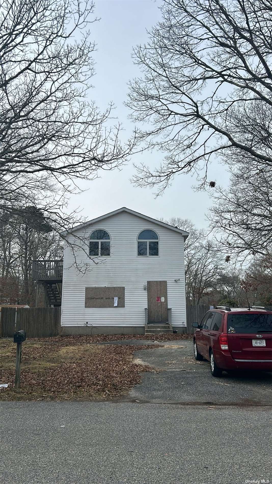 a view of a car in front of house