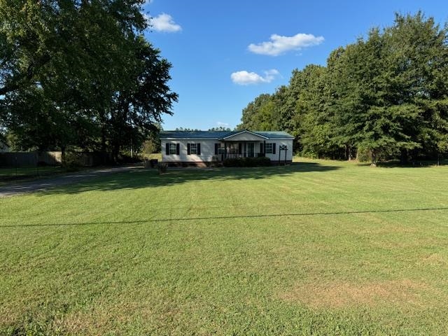 a view of an outdoor space and a yard