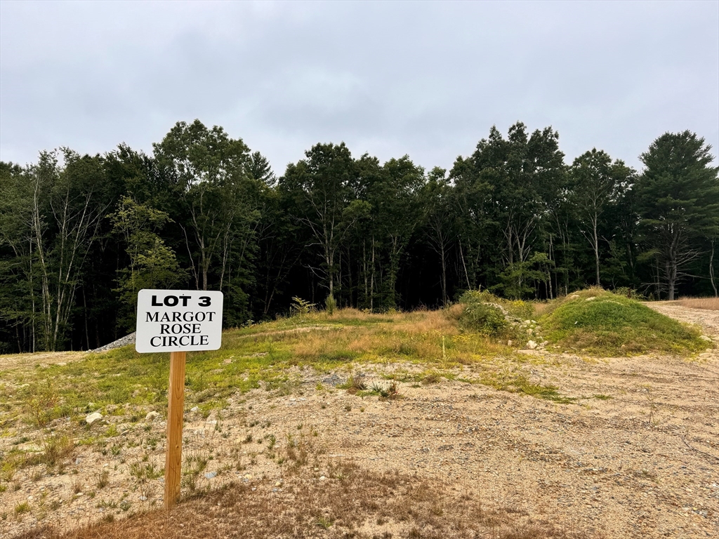 a sign that is on the side of a road