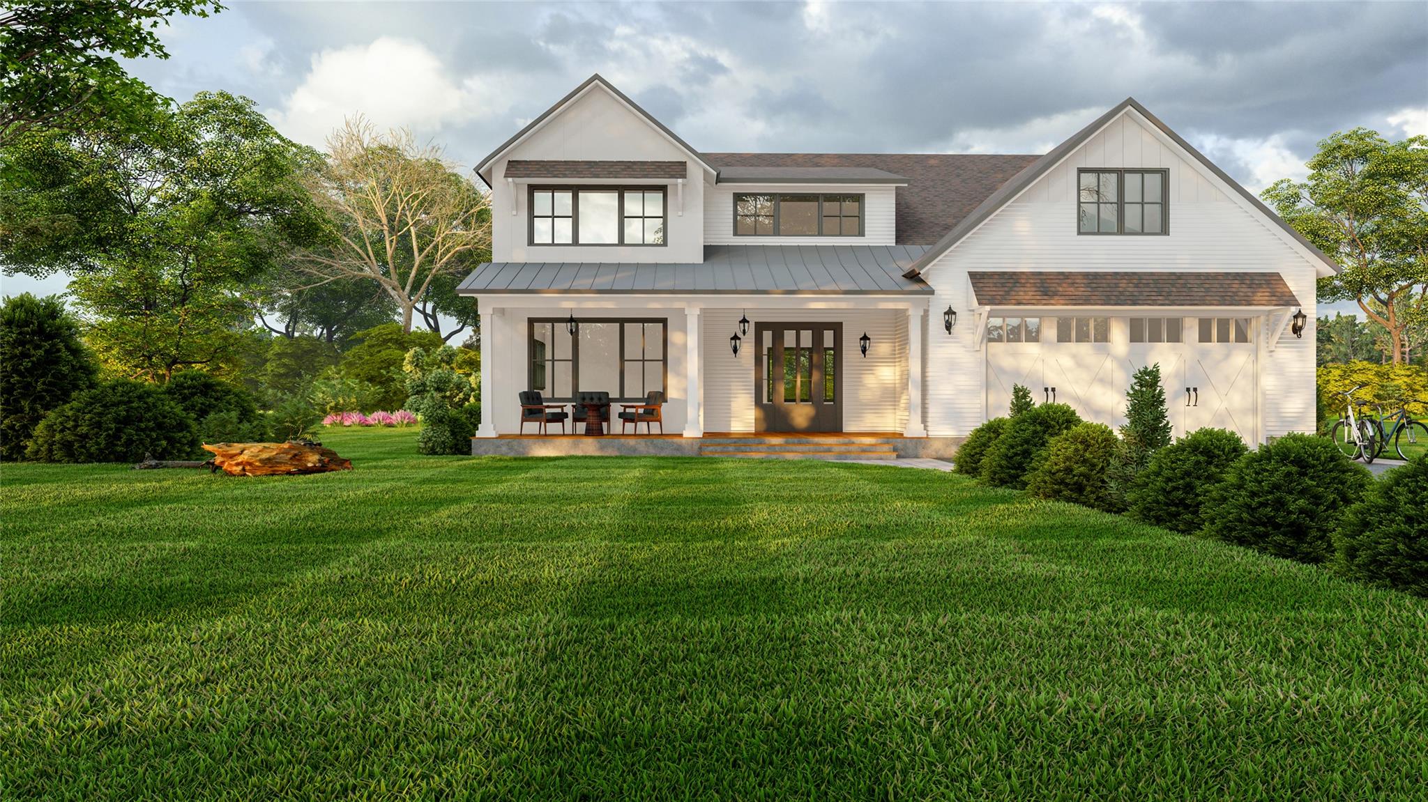 a front view of a house with a yard and trees