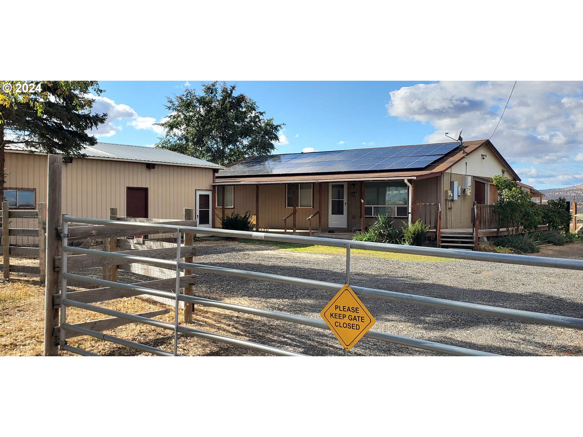 a view of house with outdoor space