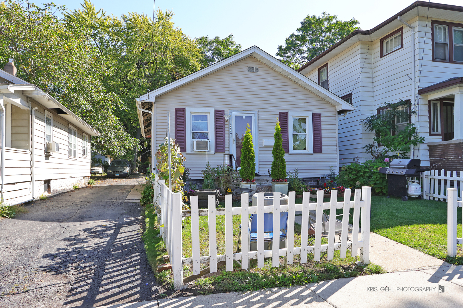 a front view of house with small garden