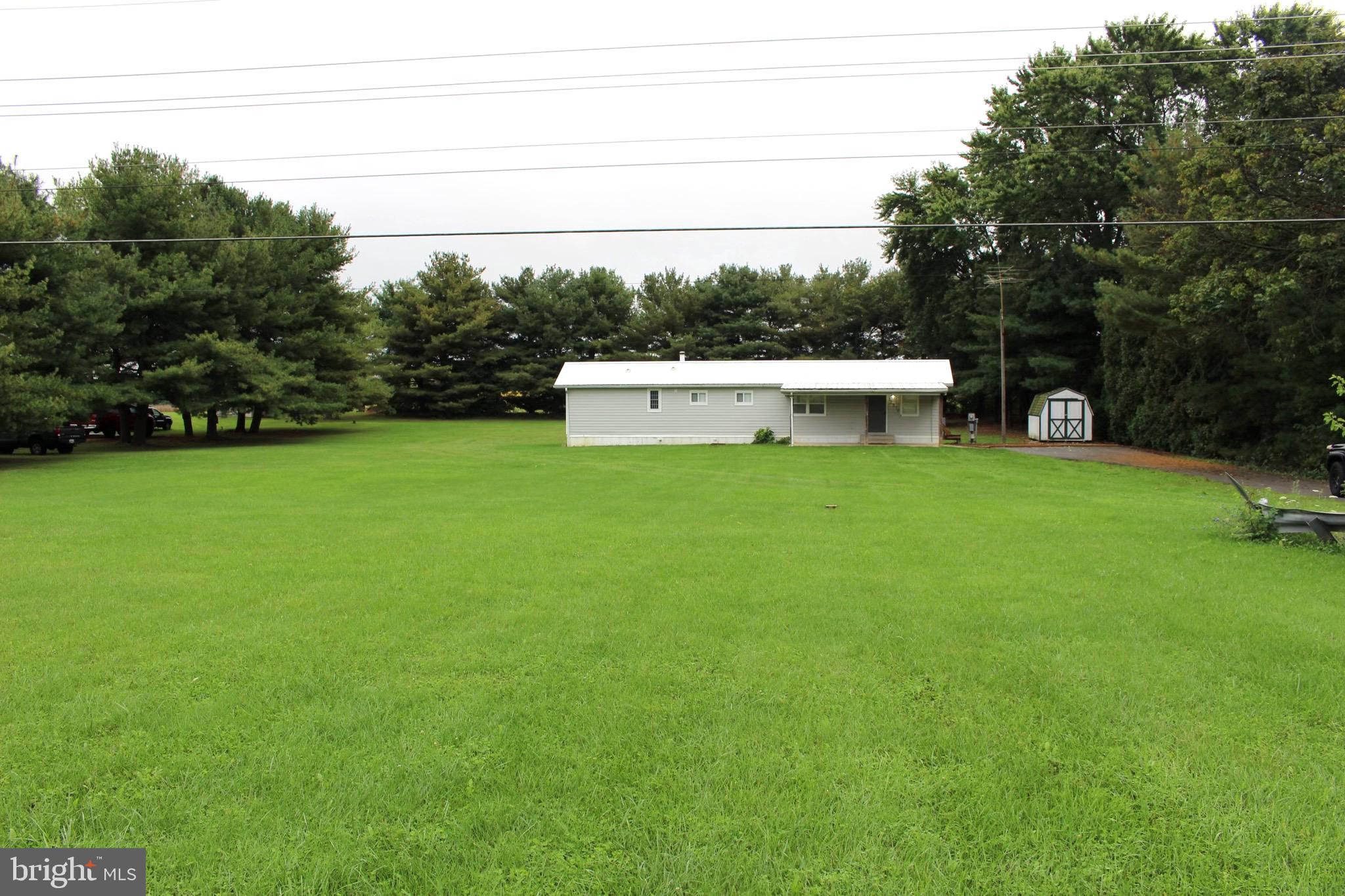 a white house with a yard