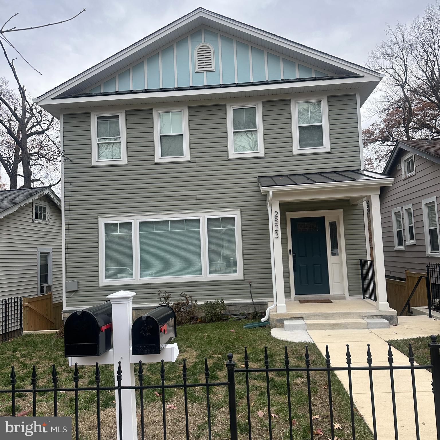 a front view of house with yard