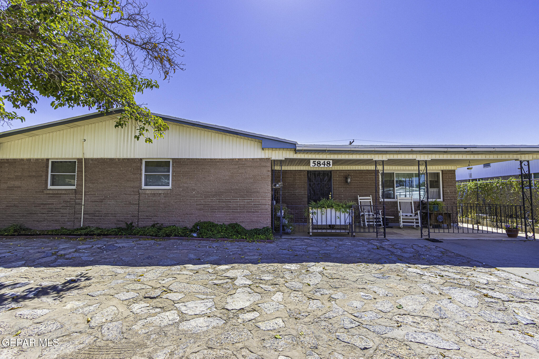 a view of a house with a patio