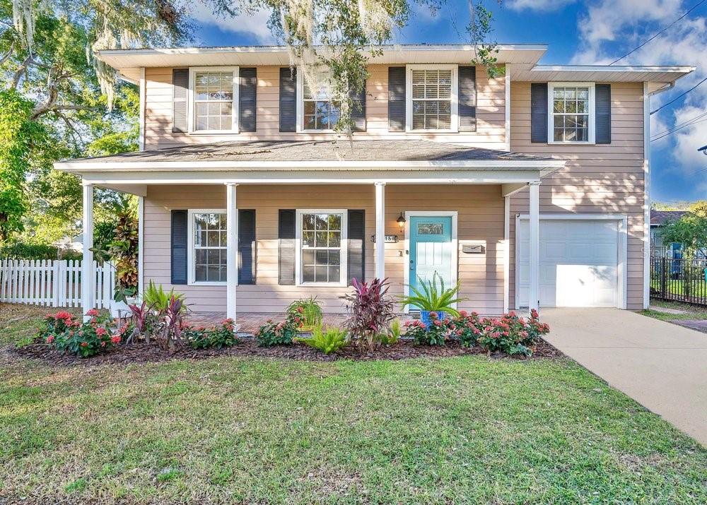 front view of a house with a yard