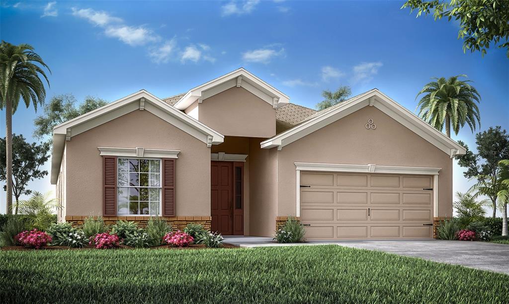 a front view of house with yard and green space