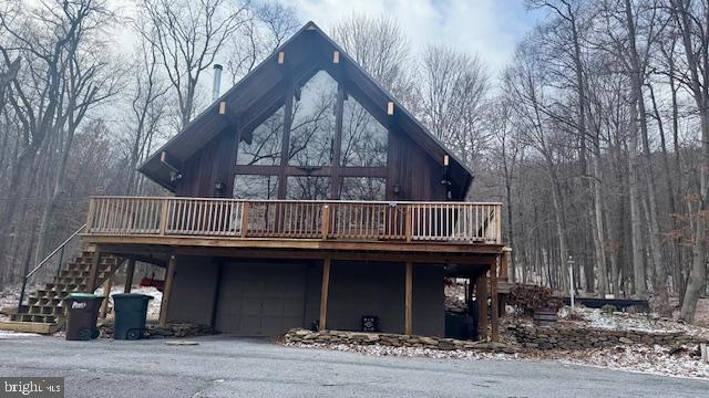 a view of house with outdoor space