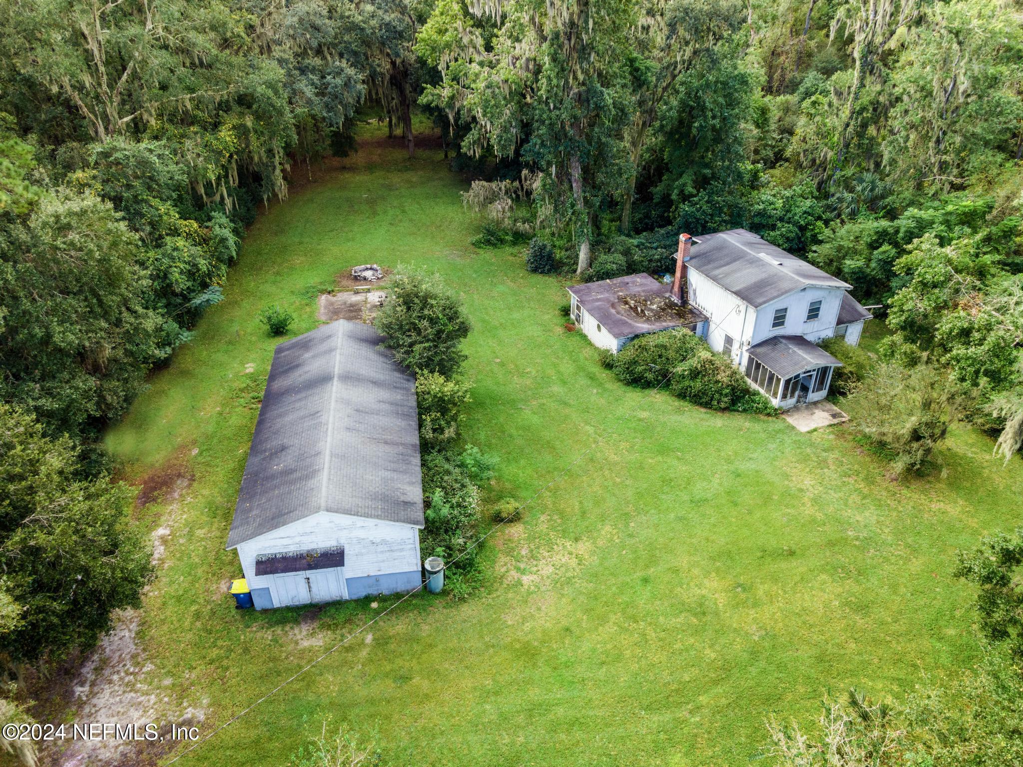 an aerial view of a house with garden