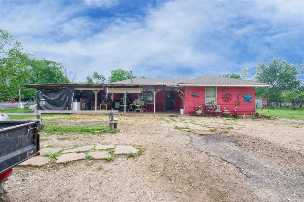 front view of a house with a big yard