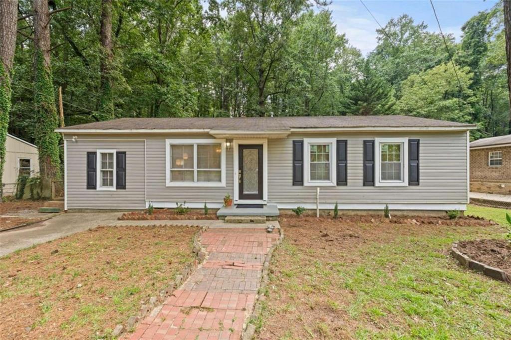 front view of a house with a yard