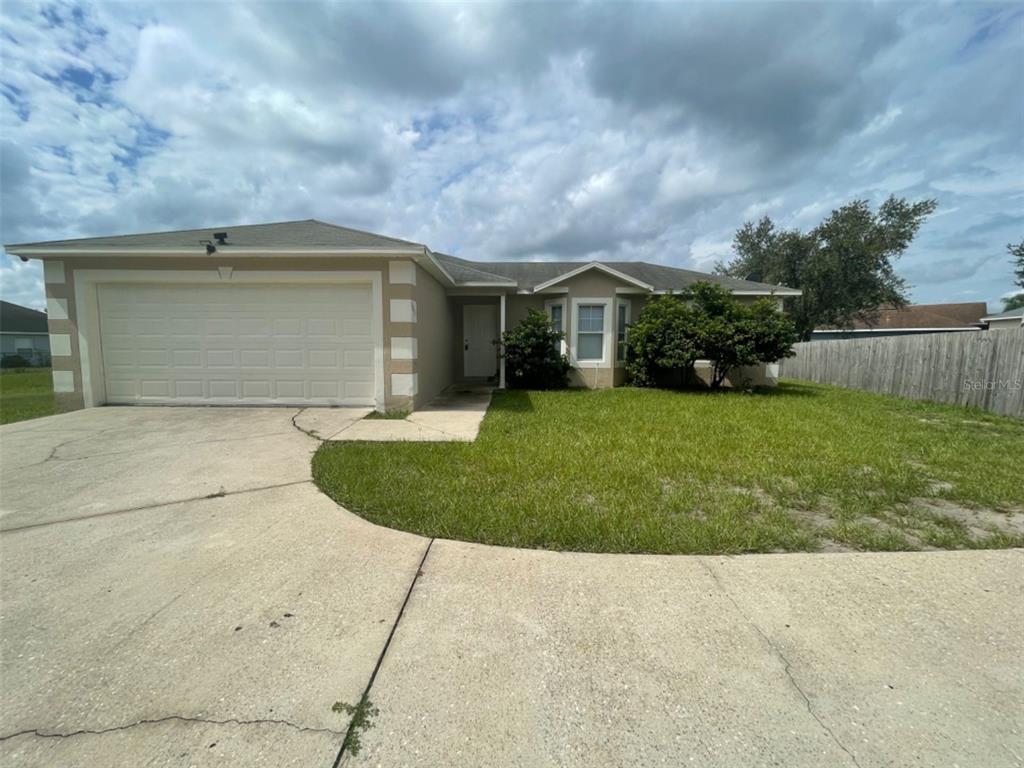 front view of house with a yard