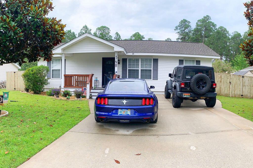 a car parked in front of a house