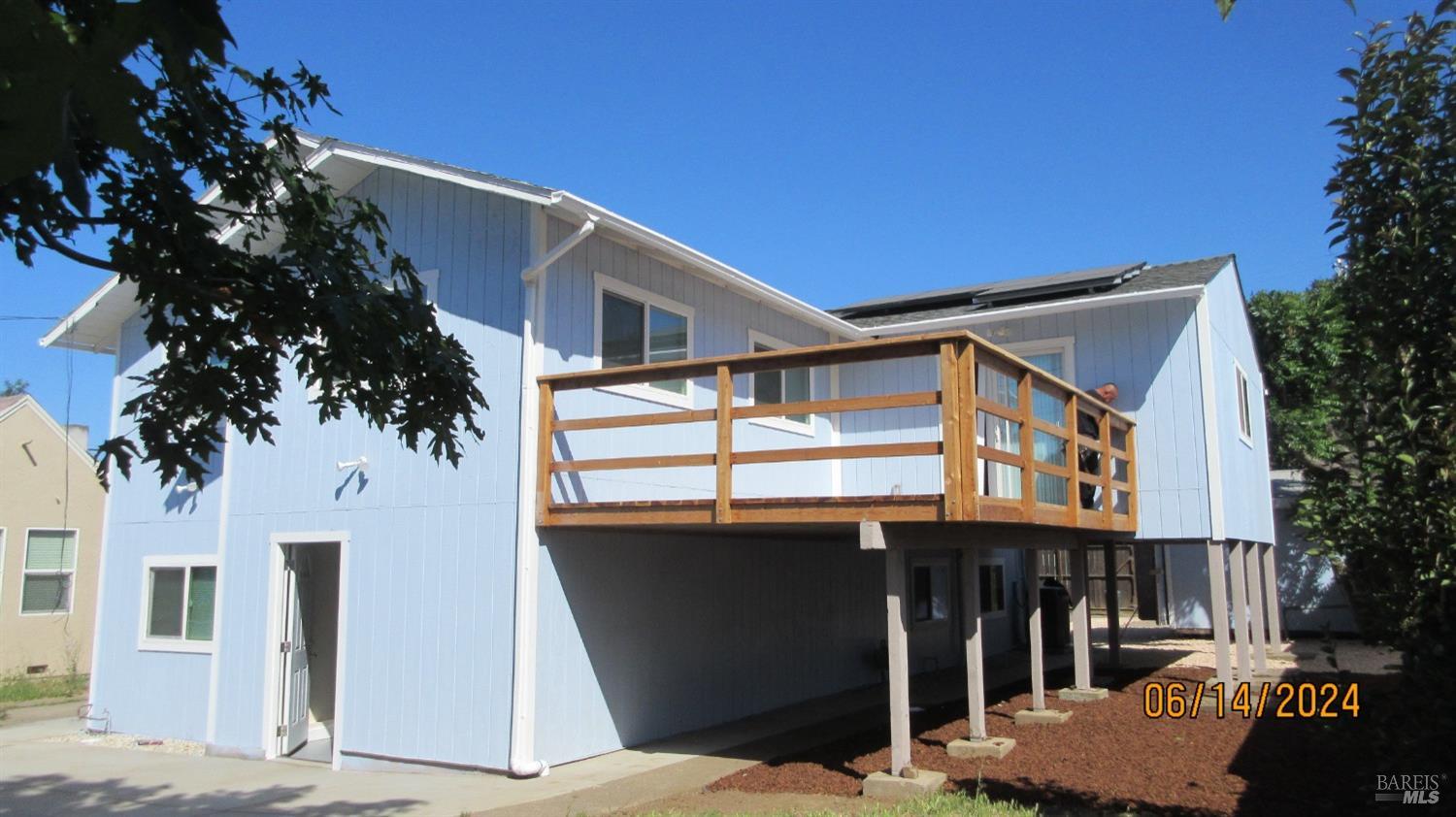 a house view with a outdoor space