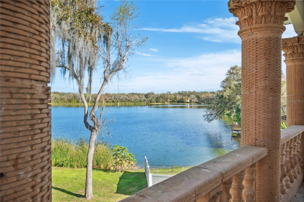 a view of a lake from a balcony