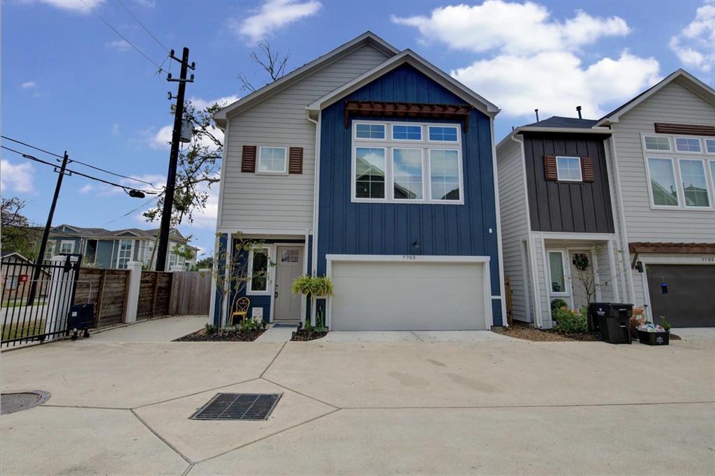 a front view of a house with parking