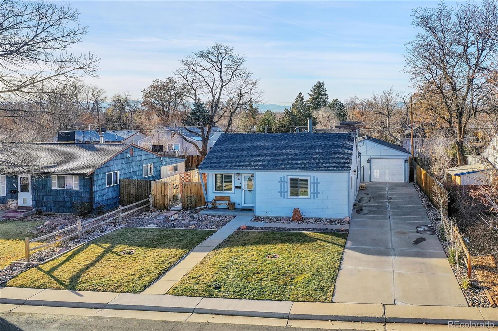 front view of a house with a yard