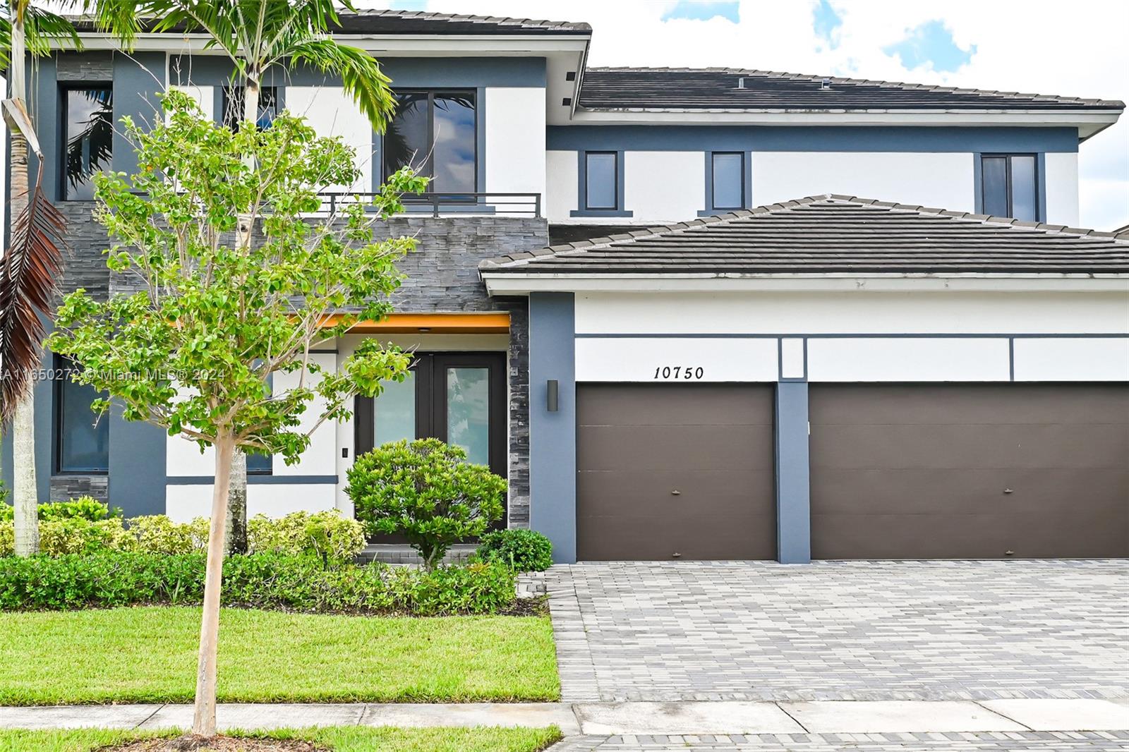 a house view with a garden space