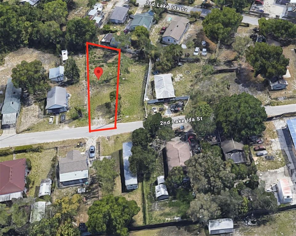 an aerial view of houses and roads