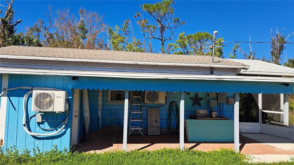 a view of a back yard of the house