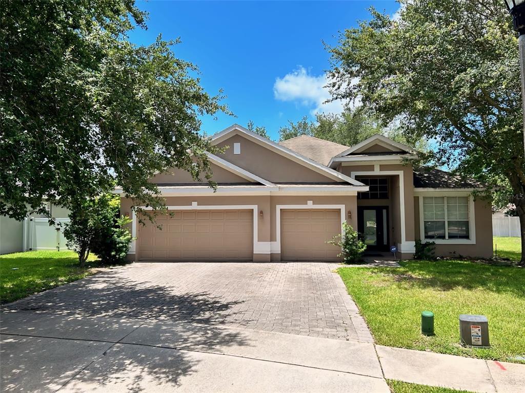 front view of a house with a yard