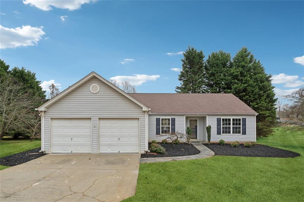 front view of a house and a yard