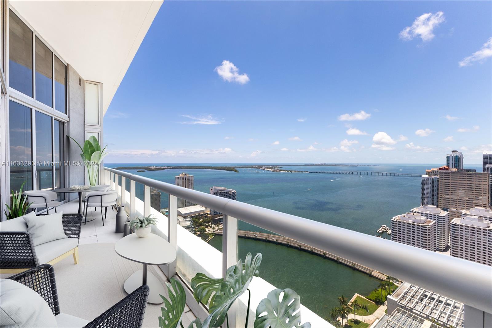 a terrace with outdoor seating and city view