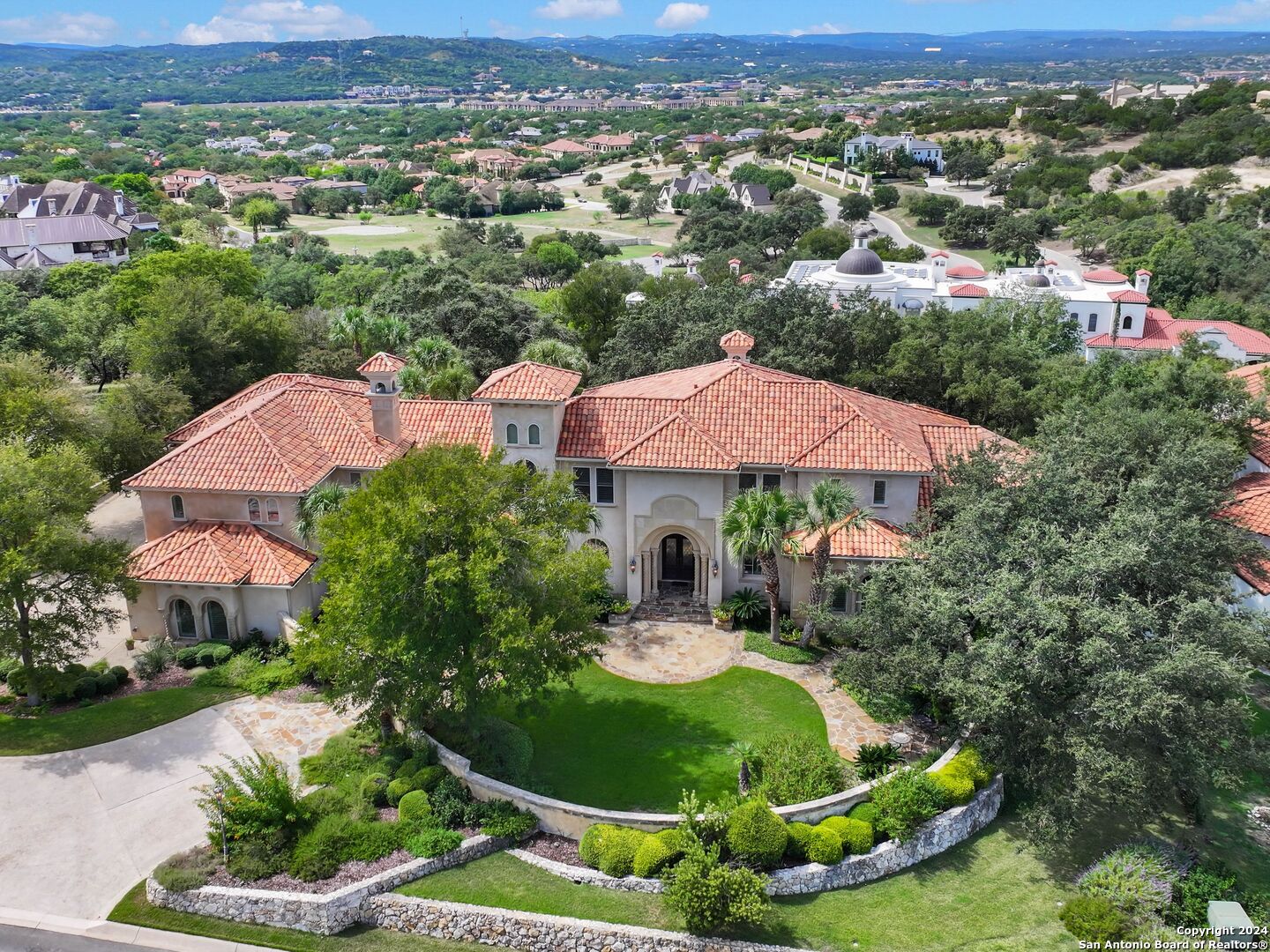 an aerial view of a house with garden