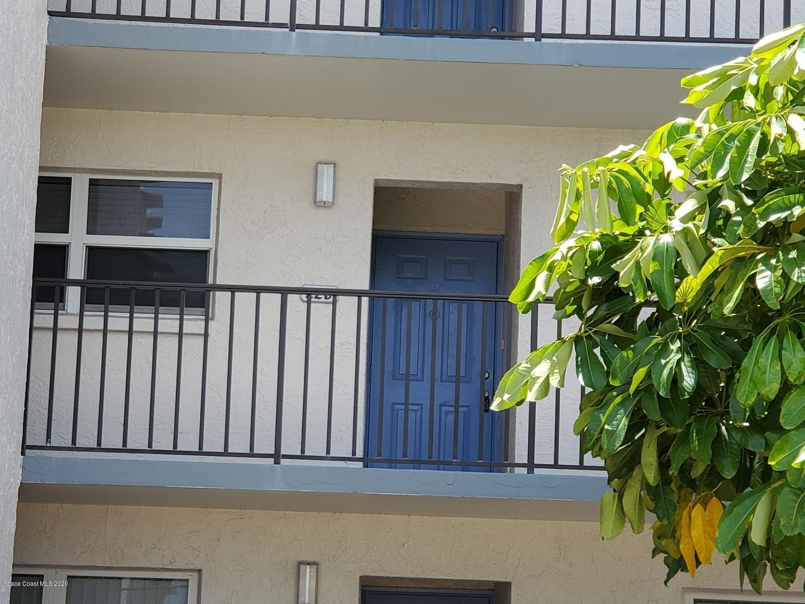 a view of a house with a flower plants