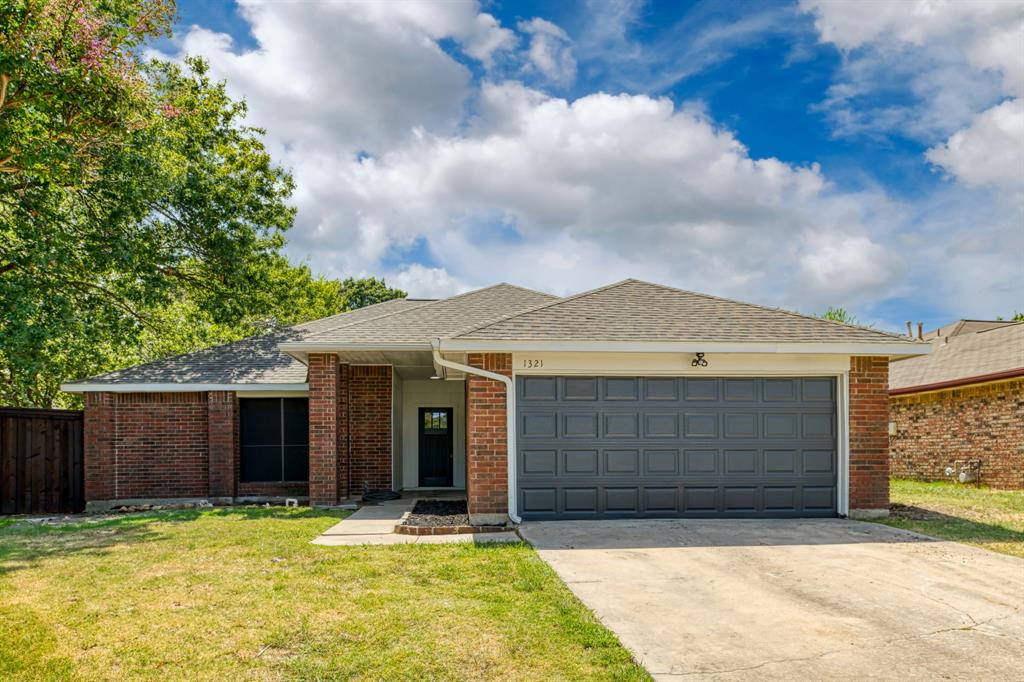 a front view of a house having yard