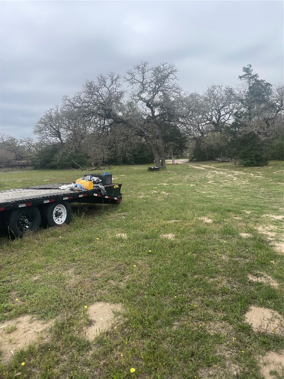 a car parked in the middle of a field