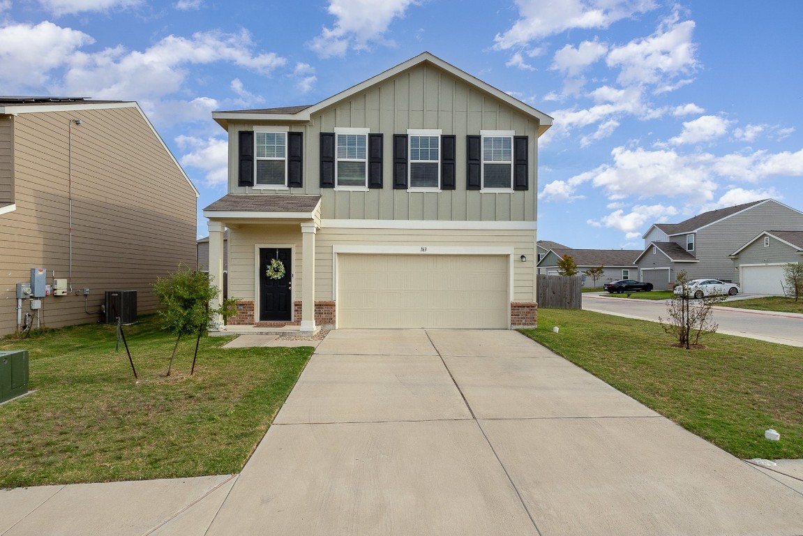 a front view of house with yard