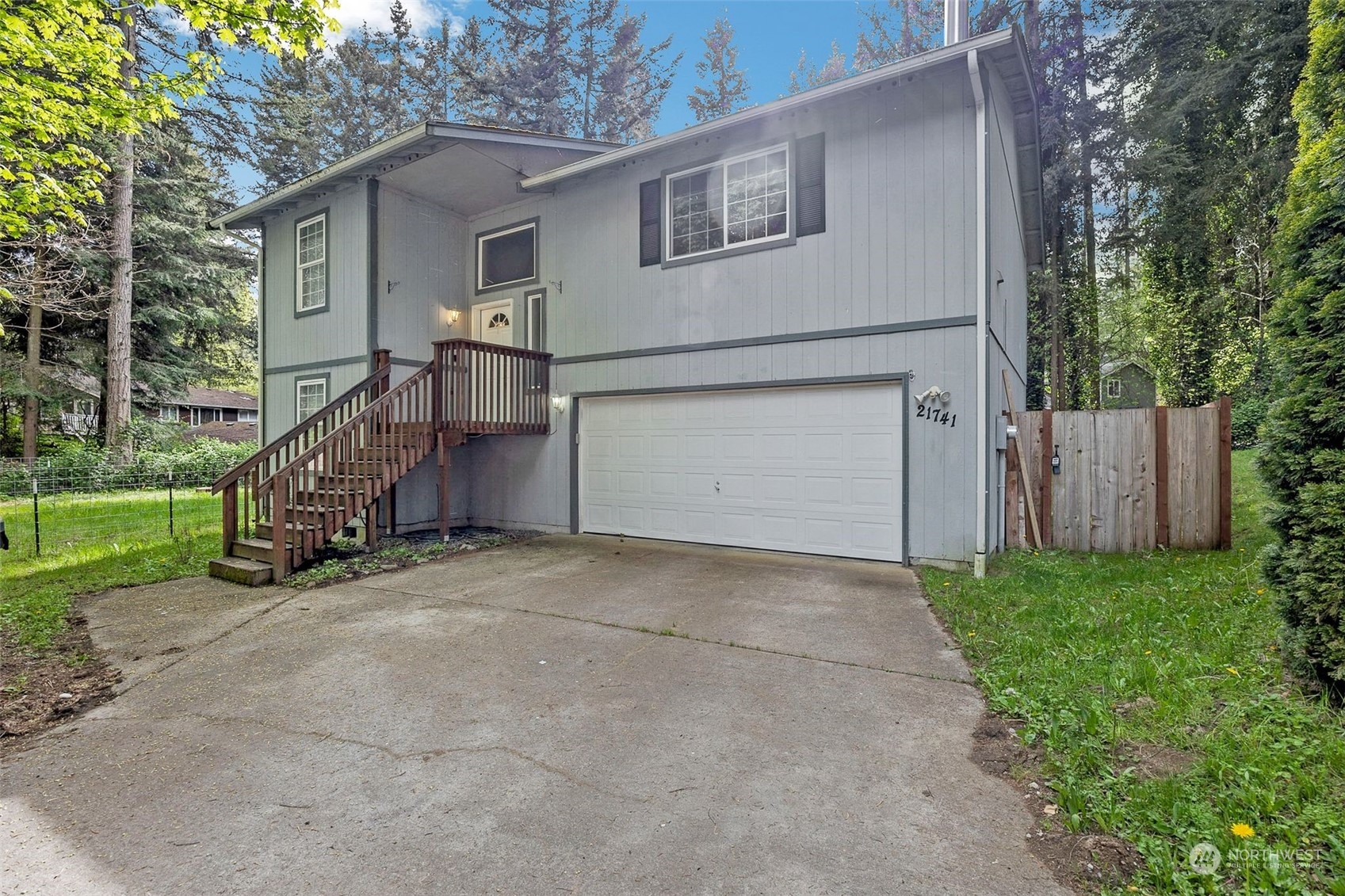 a view of a house with a back yard