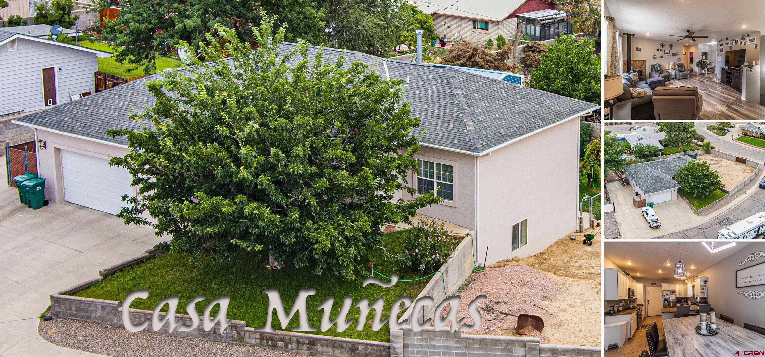 an aerial view of a house with yard