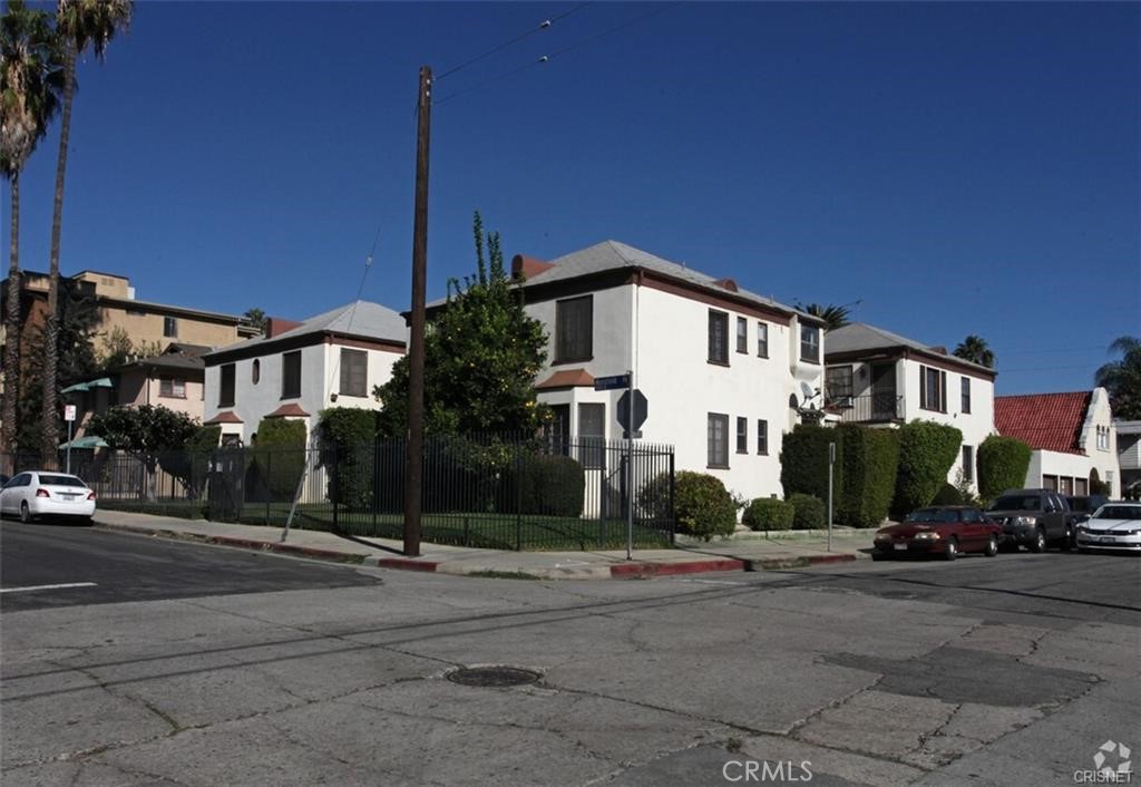 a front view of a building with street view