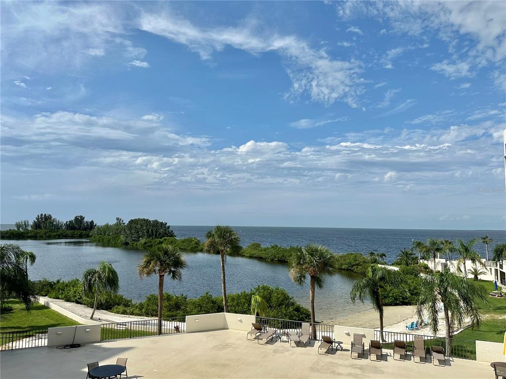 a view of a terrace with lake view