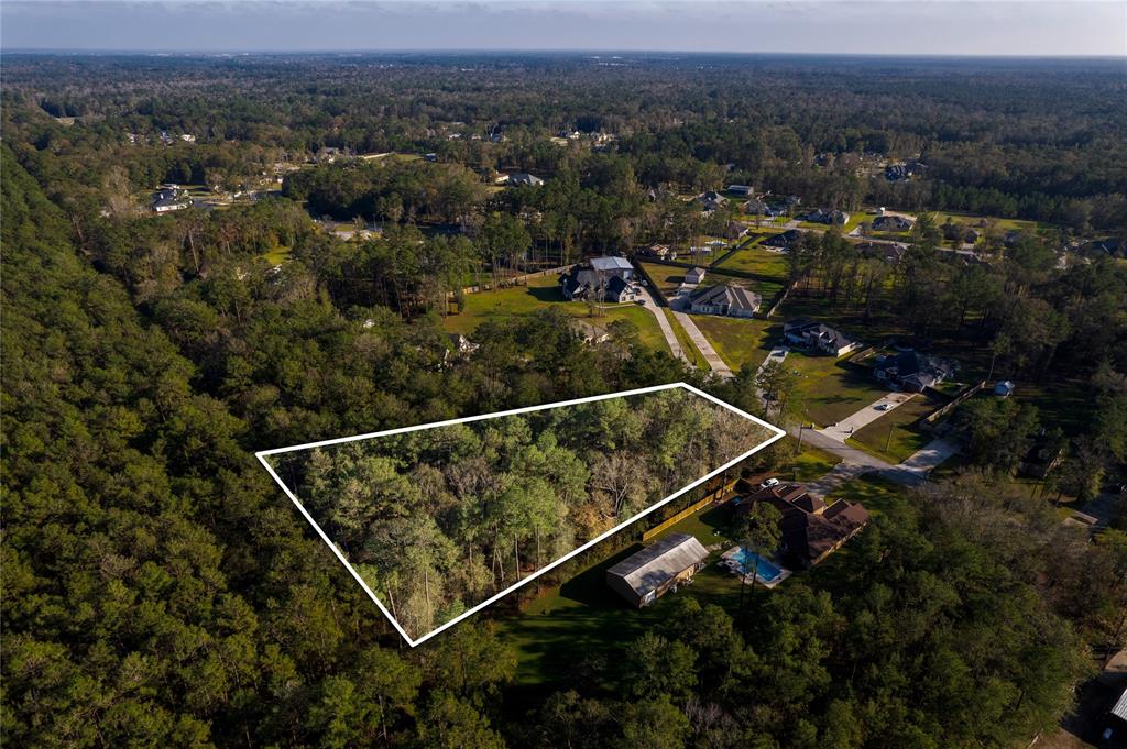 an aerial view of residential house with outdoor space